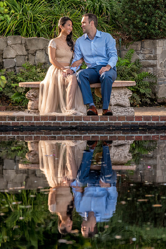 Reflections of a couple at the Cummer Museum and Gardens in Jacksonville Florida during an Engagement photo session
